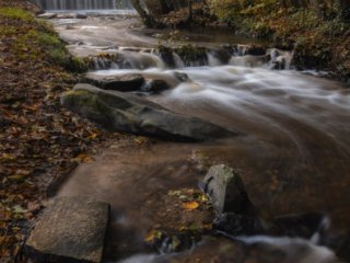 Waterfall of Vaux de Cernay in autumn