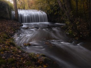 Waterfall of Vaux de Cernay with water swirls
