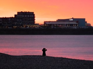 Photographer front of the casino in Mers-les-Bains