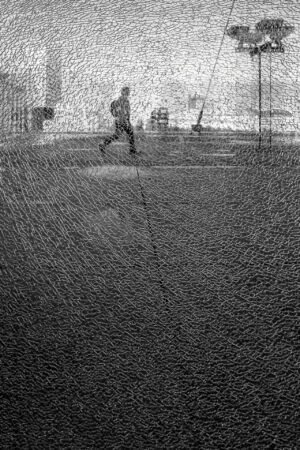 Shadow through broken glass