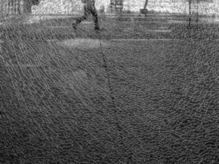Shadow through broken glass