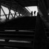 Girls crossing the Leopold Sedar Senghor bridge in Paris