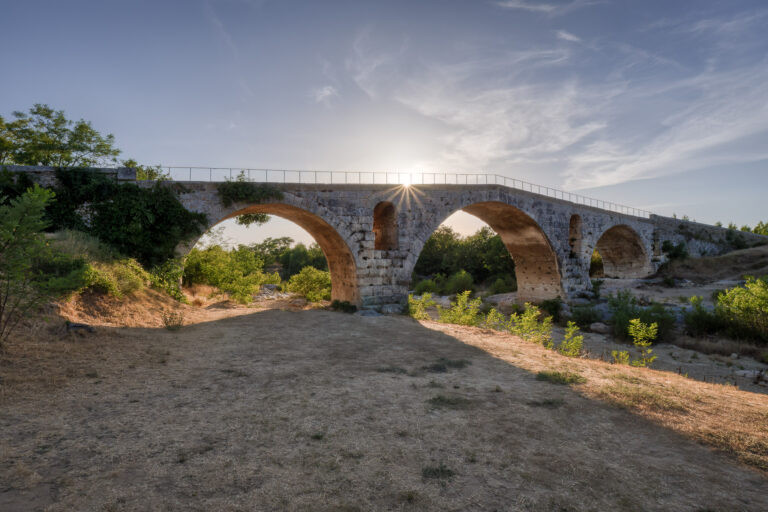 The Pont Julien, a Roman bridge at Bonnieux, at sunset, Luberon, France.