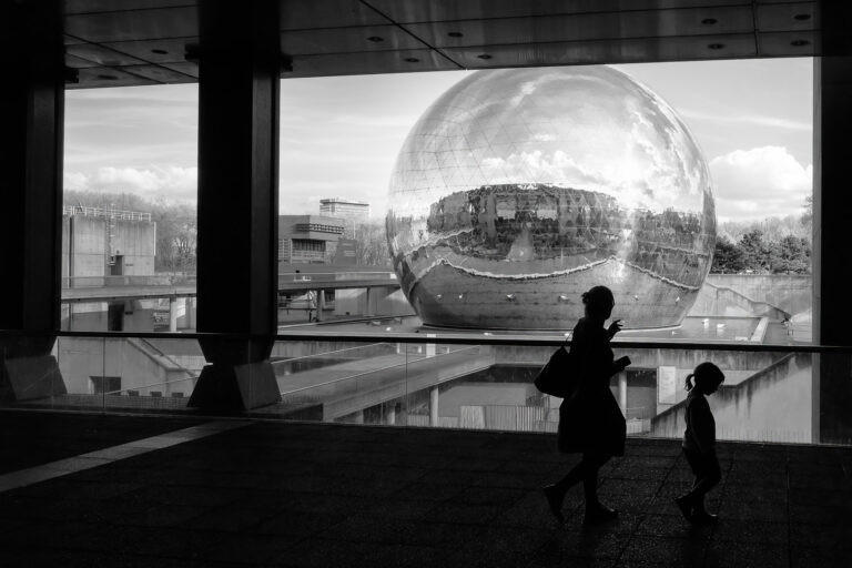 La Géode seen through the windows of the Cité des sciences, Parc de la Villette, Paris, France.