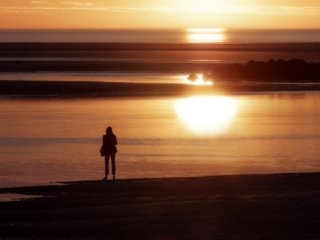 Standing front of the sunset at Berck-sur-Mer, France