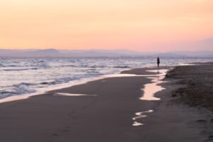 Women walking on the Espiguette beach at Le Grau Le Roi, France