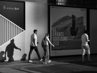 People walking at Bibliotheque Nationale de France (BNF), Paris, France.