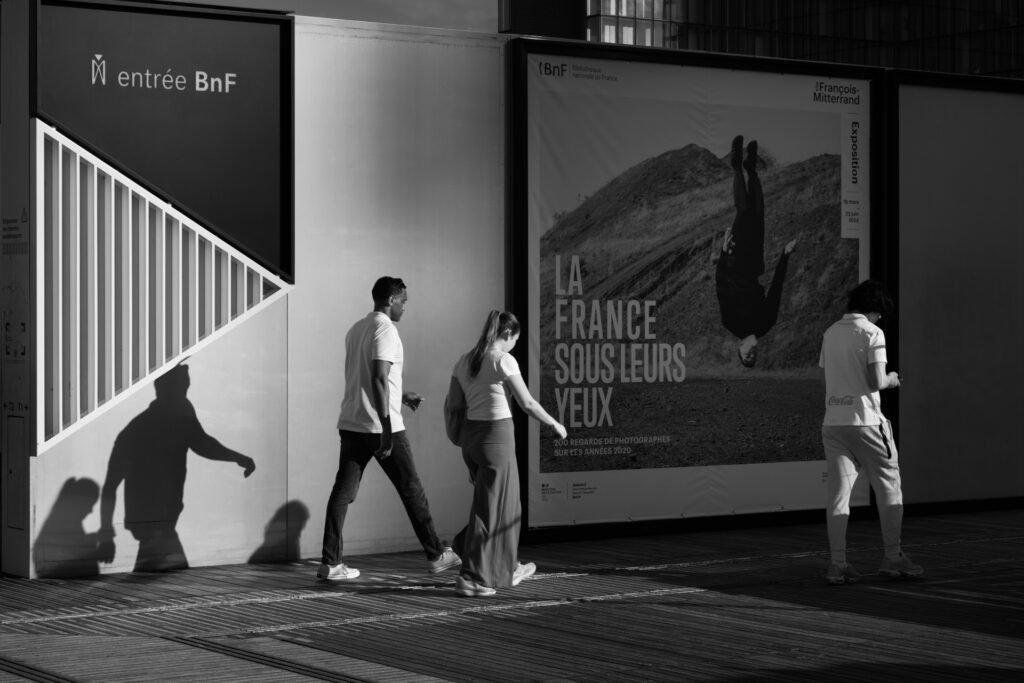 People walking at Bibliotheque Nationale de France (BNF), Paris, France.