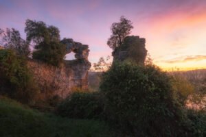Rocks over Dordogne river at sunrise, Vitrac, France.