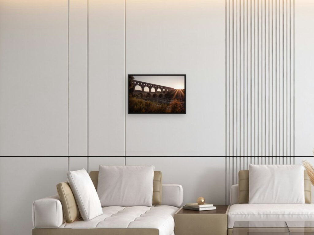 Bridge sunlights in Medium (60&nbsp;×&nbsp;40&nbsp;cm), black floater frame, above a sofa (room view)