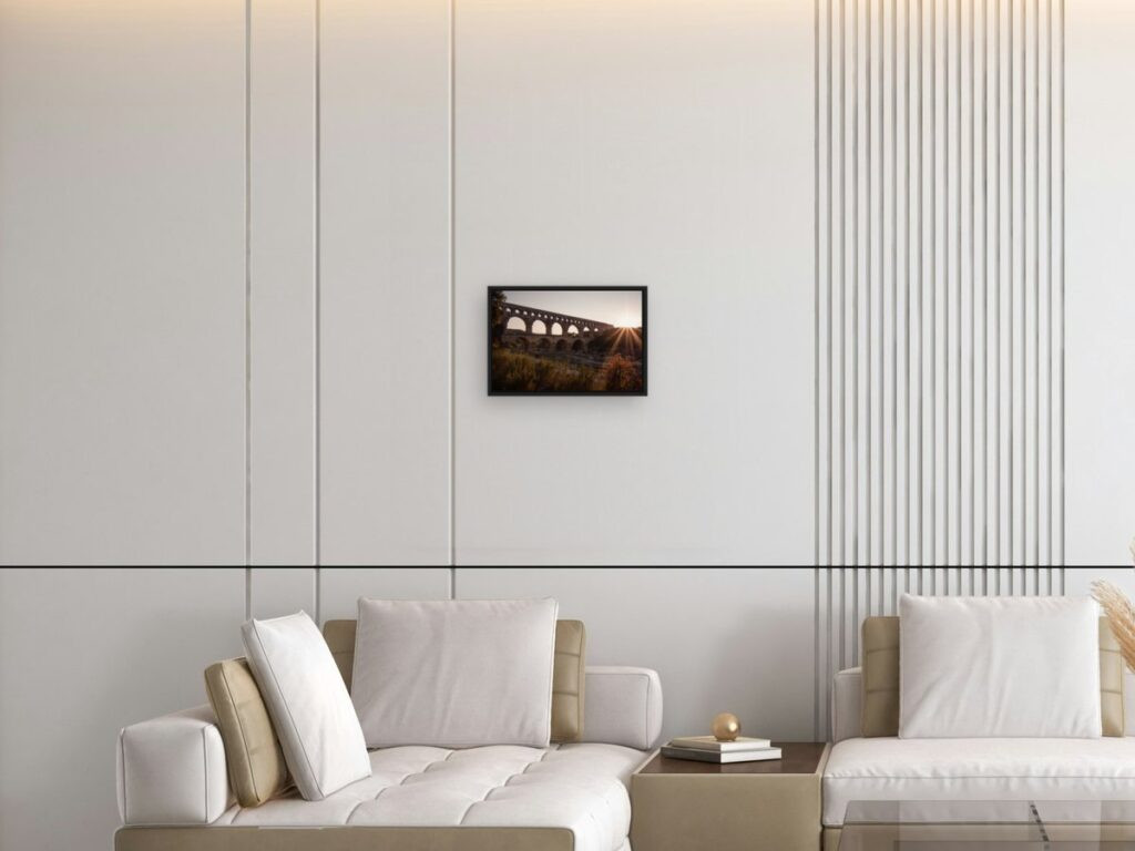 Bridge sunlights in Small (45&nbsp;×&nbsp;30&nbsp;cm), black floater frame, above a sofa (room view)
